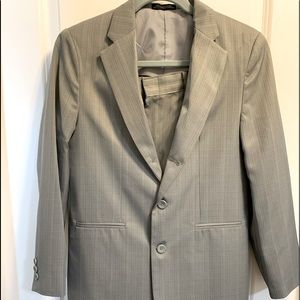 Young mens suit. Mid to light gray. Sz 16R. Slight striping. Worn a few times